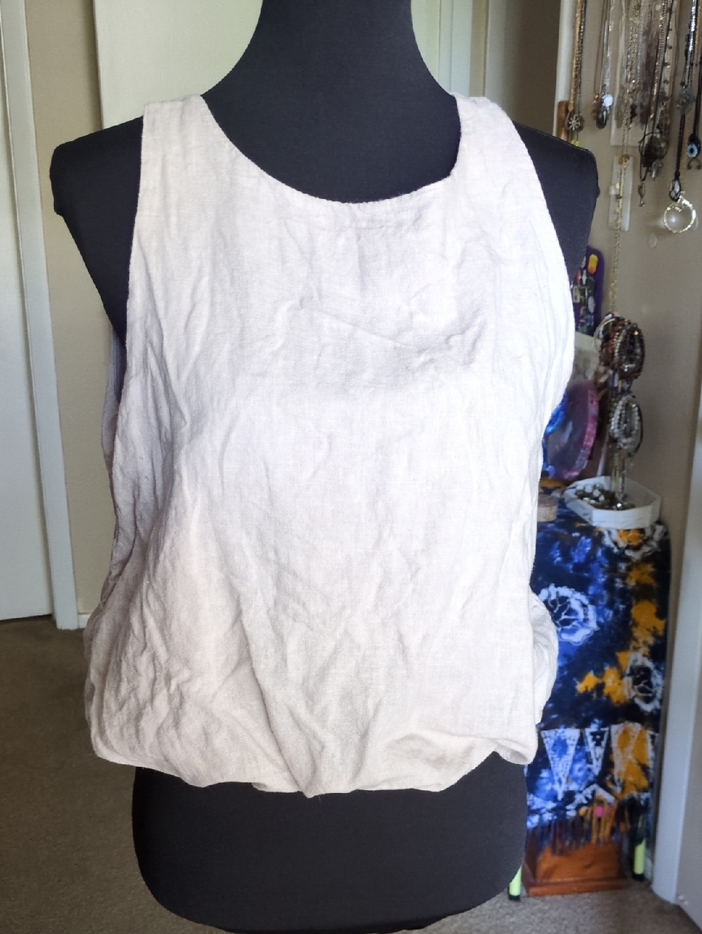 cream relaxed-fit linen blend tank top w a scoop neck & a subtle cinched waist